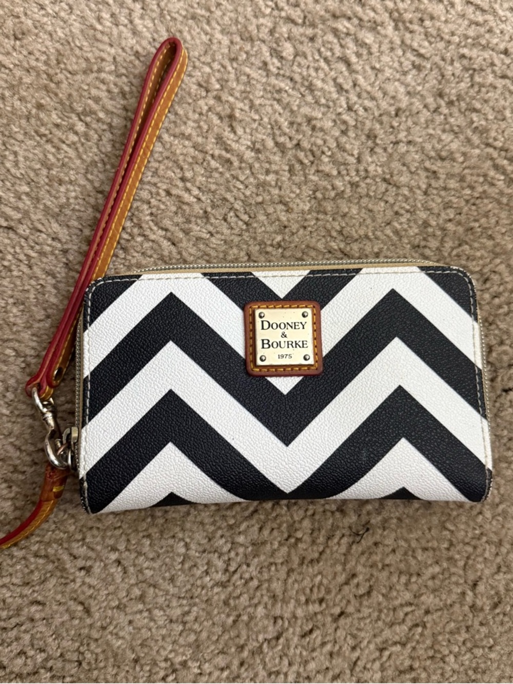 Dooney & Bourke Black and White Chevron Clutch with Gold Plaque